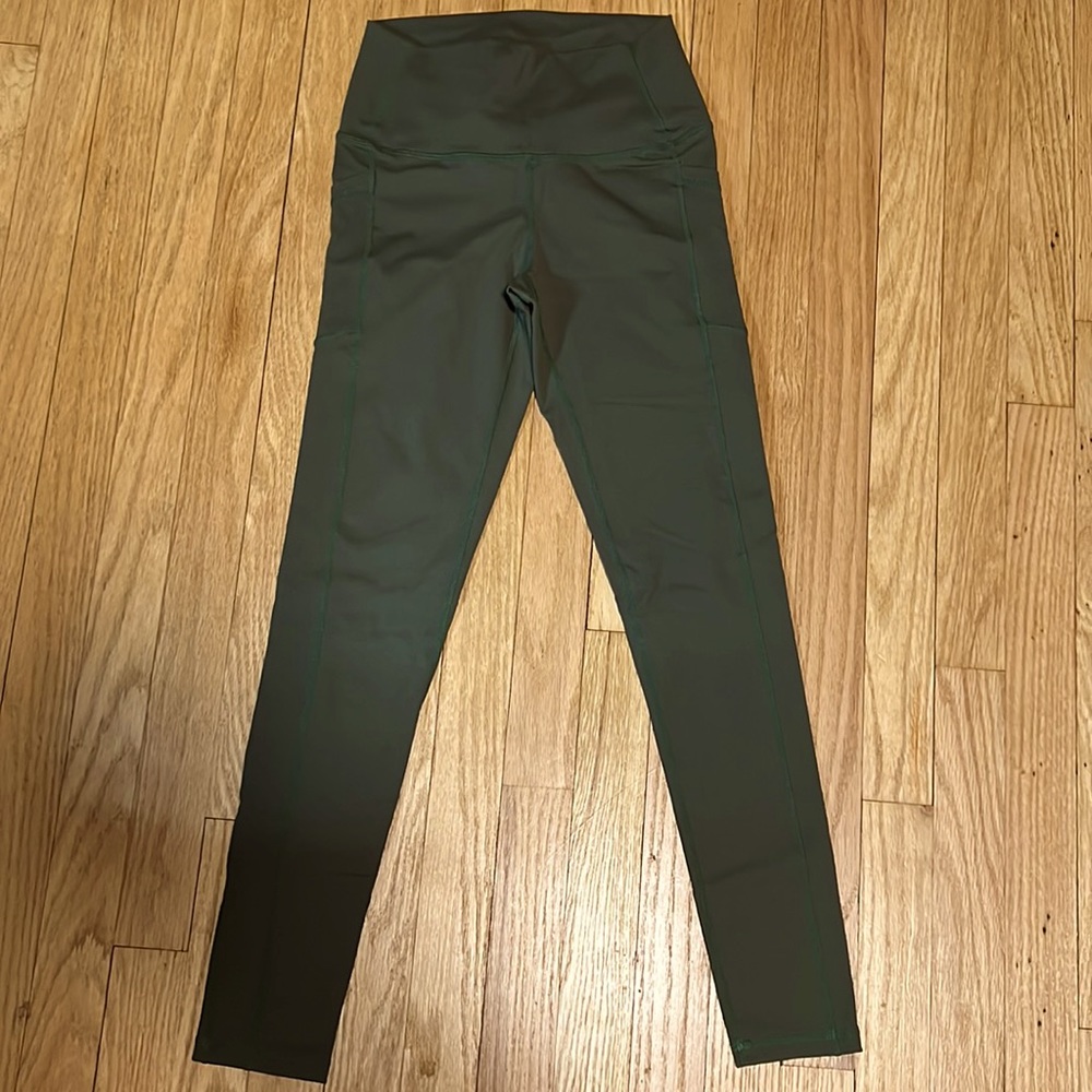 BuffBunny high waisted ankle pocket leggings in moss green color